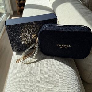 CHANEL -New Navy Blue Tweed Cosmetic Pouch. New condition.